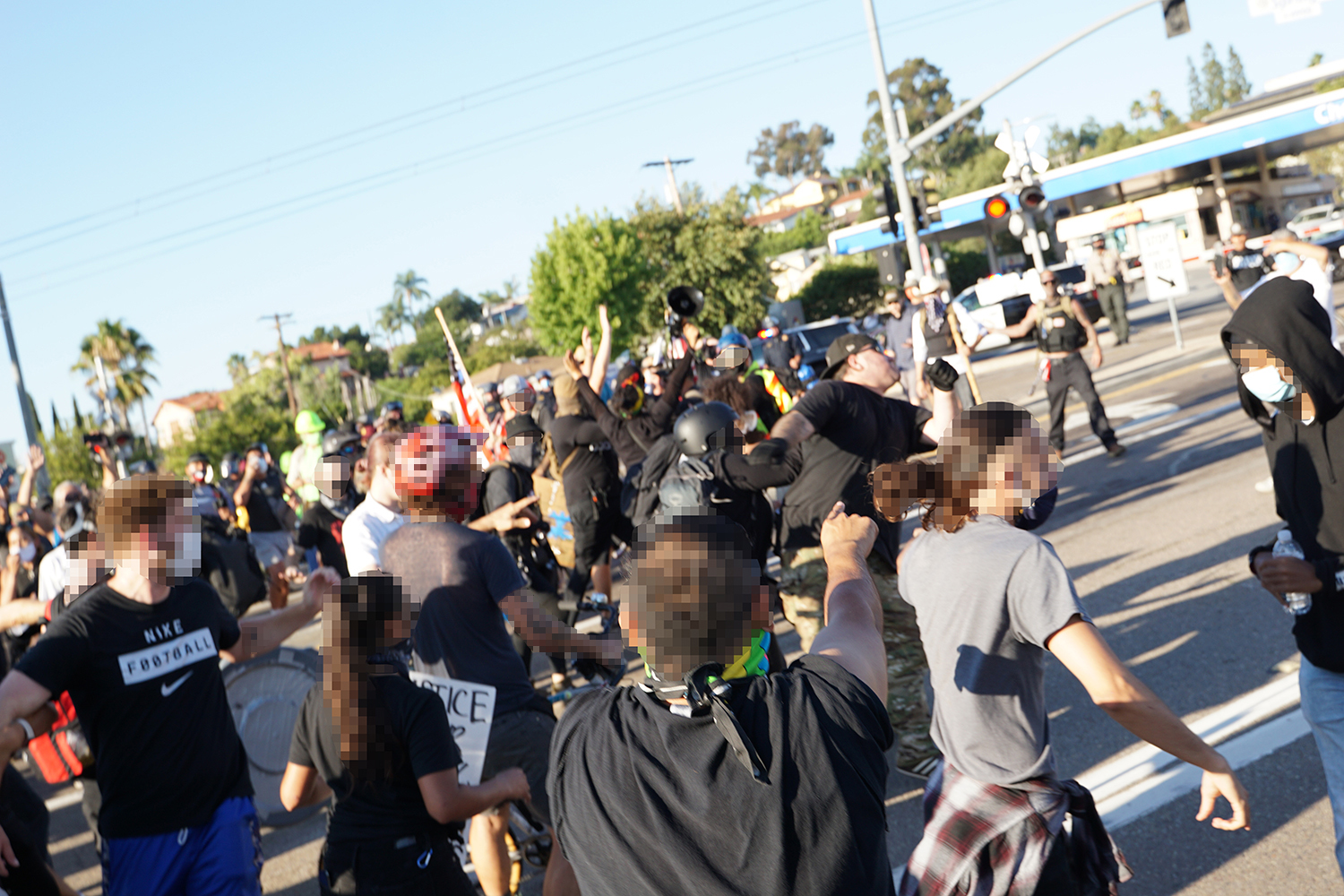 McAdams attacked protestors but after a scuffle protest security were able to keep marchers safe. Photo by Tom Mann.