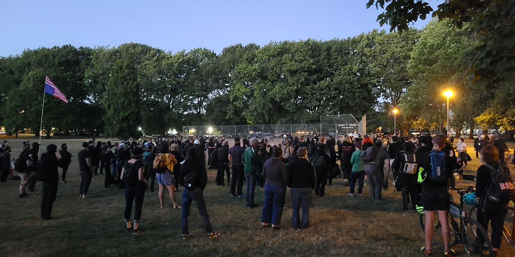 The differences in crowd size between Friday or Saturday nights versus Sunday or weekday nights is truly staggering. More impressive is that the activists DO NOT CARE they are outnumbered tonight and taking on a broken system. Photo by James O'Ryan.