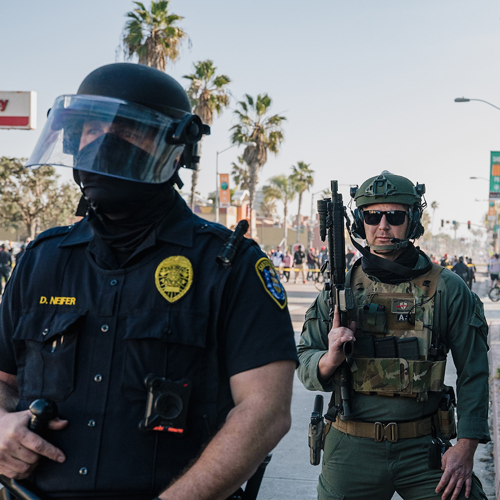 A SWAT officer with a rifle.