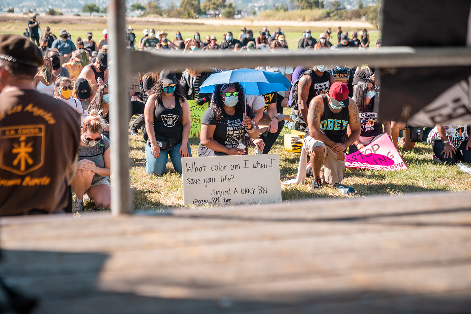 Protest attendees kneel for 8 minutes and 46 seconds – the amount of time that Minneapolis police Derek Chauvin held his knee to George Floyd’s neck— during the “Zero Tolerance for White Supremacy” protest in Martinez, Calif., on Sunday, July 12, 2020.