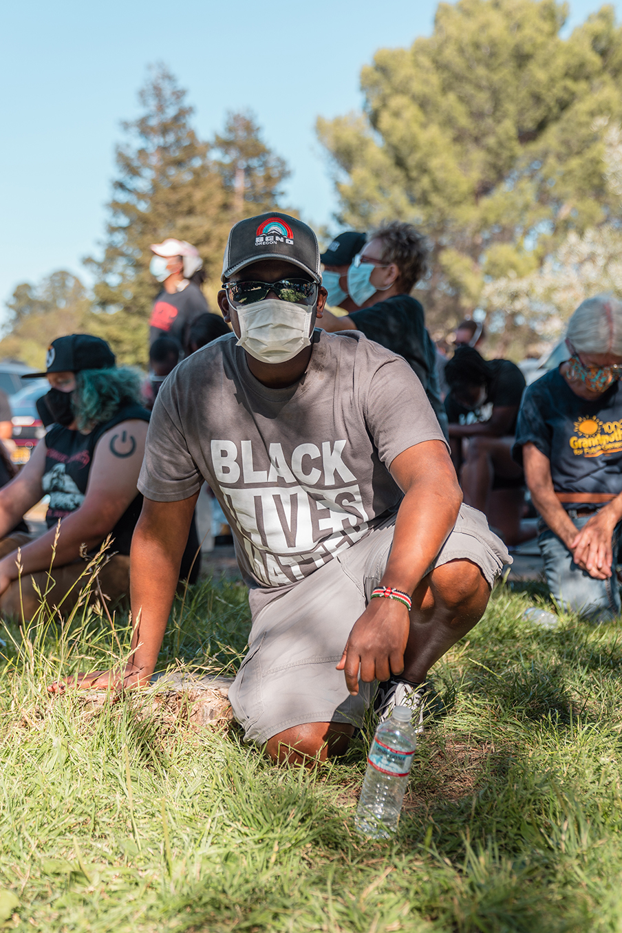 A protester kneels for 8 minutes and 46 seconds – the amount of time that Minneapolis police held their knee to George Floyd’s neck — during the “Zero Tolerance for White Supremacy” protest in Martinez, Calif., on Sunday, July 12, 2020.