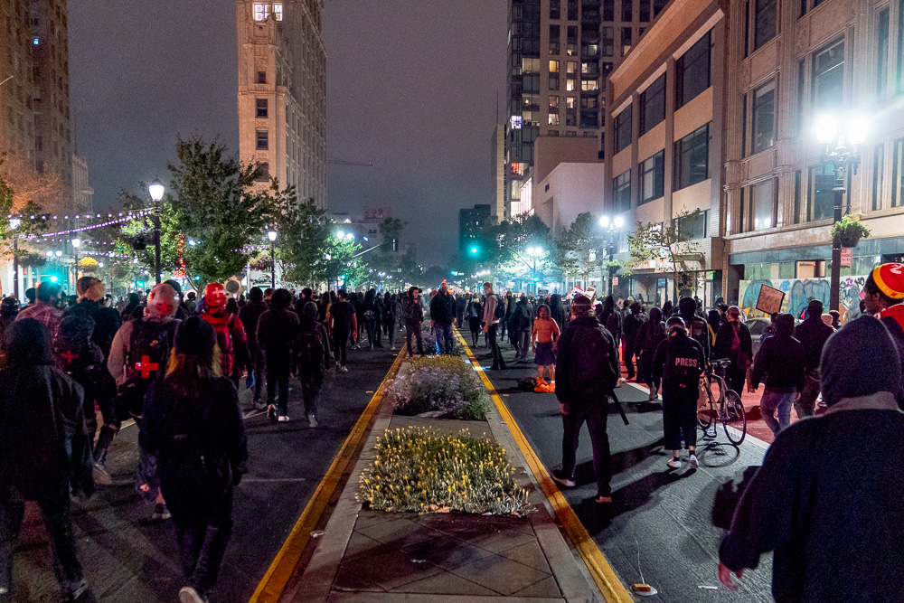 Several hundred people marched through the streets in solidarity with protests in Kenosha, Wis. during the 'Justice for Jacob' protest in Oakland, Calif., August 26, 2020.