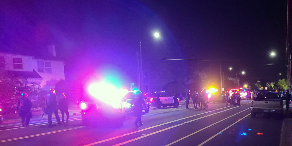 During a long and mostly cooperative walk down North Denver Avenue the official word reached us - Gentlefolk, we have ourselves another good ol’ fashioned Portland Police riot. The crowd responds to this with fireworks of celebration. Photo by James O'Ryan.