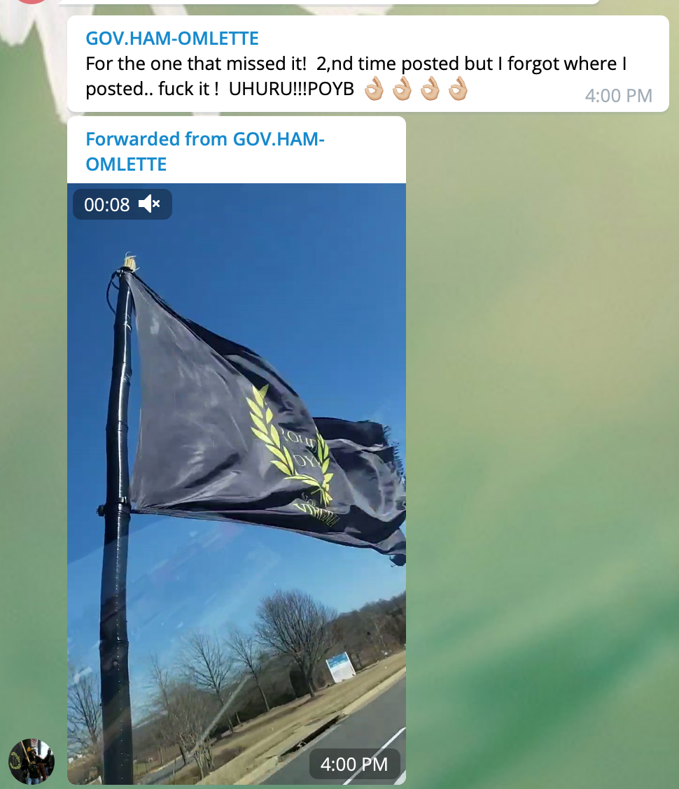 A user named 'GOV. HAM-OMLETTE', identified as Virginia Proud Boy Russell Hampton Ouelette, posts a video of a flying Proud Boys flag in the 'Patriot Party National ' channel. The attached post reads: 'For the one that missed it! 2,nd time posted but i forgot where I posted.. fuck it ! UHURU!!!POYB 👌👌👌'