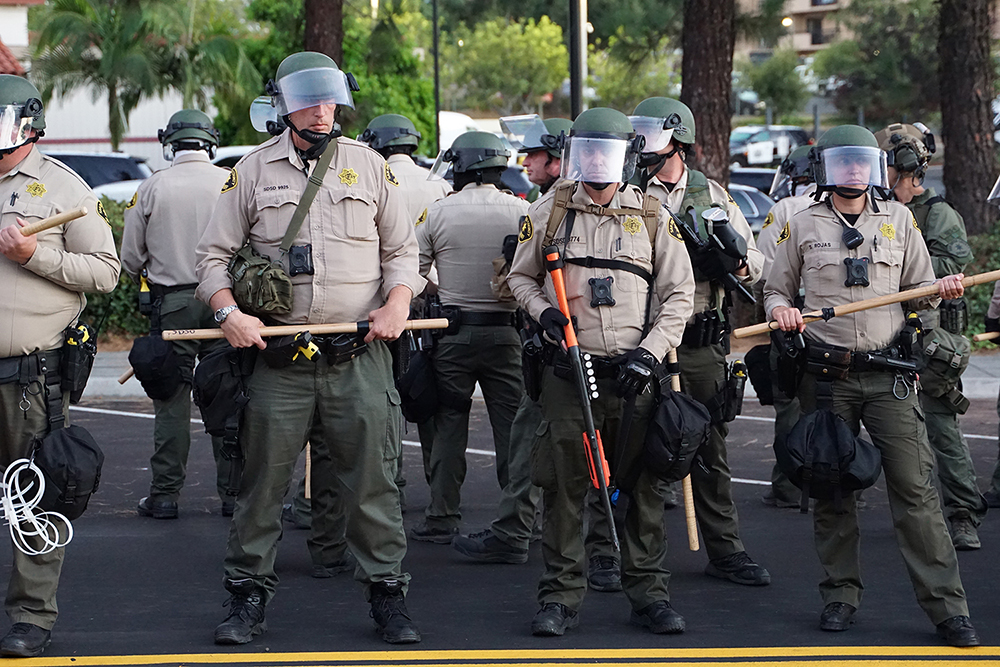 Some kid called this cop a 'Reptar-looking motherfucker.' Photo by Tom Mann.